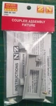 Micro Trains 988 00 191 Coupler Assembly Fixture #702. Fixed Price $18.00.