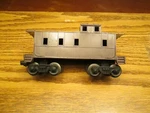 Lionel 6167-E Darkbrown Caboose 1963-64. Fixed Price $325.00.