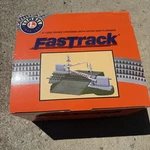 Lionel #12062 Fastrack Grade Crossing W/gates & Flashers. Fixed Price $170.00.