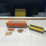 Lionel No. 3652 Operating Car, Yellow W/ Barrels Boxed. Fixed Price $18.74.