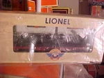 Lionel----# 39463-----POSTWAR Celebration Series Flatcar With Trailers. Fixed Price $51.99.