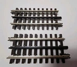 Atlas 6051 3-RAIL 4 1/2" Straight Track Sections, New Loose Stock. Fixed Price $12.88.