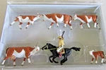 Preiser (ho) - Cowboy Horseback Herding Longhorn Cattle #10159. Fixed Price $30.95.