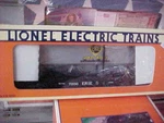 Lionel,,,,,# 19415,,,,,,ERIE Flatcar With Trailer. Fixed Price $37.99.