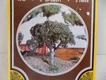 Three Up Swept Trees TK15 By Woodloand Scenice Po. Fixed Price $6.95.