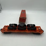 Lionel Postwar Gauge Orange Rail Car With Trucks #636255 + Box. Fixed Price $69.99.