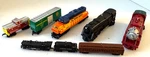 8 Hallmark Lionel Train Christmas Ornaments 4 Engines Caboose Tender 2 Box Cars. Fixed Price $24.99.