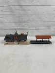 Ho Scale Model Power South Side Station No. 570 Lighted W/ 2 Figures Box. Fixed Price $28.60.