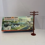 Plasticville O/O27 - #1630 Telephone Poles (12 Pcs). Fixed Price $10.00.