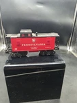 Lionel O- Pennsylvania Caboose 477947 #26549. Fixed Price $15.99.