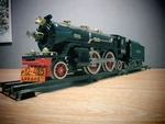 Lionel Classics 1- 390E Standard Gauge Steam Locomotive 4-4-2 Black Red Gold. Fixed Price $510.00.