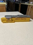 Lionel Union Pacific Gauge Yellow And Gray Diesel # 1977 Shell Only Lighted X2. Fixed Price $20.00.