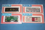 American Flyer By Lionel Freight Cars: #4-9200, #4-9204, #6-48306 And #6-48706. Fixed Price $62.95.