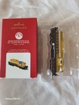 Hallmark QXE3244 Lionel Ornament Train 2348 Minneapolis & St. Louis GP-9 Diesel. Fixed Price $66.00.