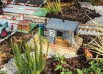 Pola 330878 Scale Gatekeeper's Stall With Moving Figure -- Kit. Fixed Price $162.99.