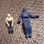Lionel 50 - 84 Gauge Blue Fixed Seated Crewman Figure & Passenger. Fixed Price $5.00.