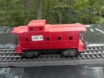 Lionel Caboose 6009 Red Lines. Fixed Price $16.95.
