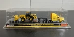 1/87 Norscot Peterbilt Semi Model 389 W/ Lowboy Trailer & Cat 950G Wheel Loader. Fixed Price $59.99.