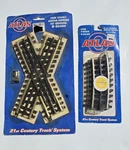 Atlas 6081 Gauge 3-RAIL Custom Supreme 45 Degree Crossing + O36 1/4 Curve. Fixed Price $25.88.