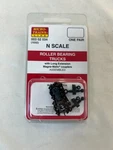 Micro Trains 003 02 034 (1032) Sacle Roller Bearing Trucks Pair). Fixed Price $6.94.