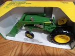 Nib Ertl # 517 John Deere Utility Tractor W/ Front End Loader 1:16 Scale Heavy. Fixed Price $44.99.
